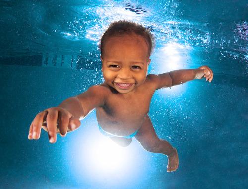 flavorwire:Cute babies learning to swim. You. Are. WELCOME. 