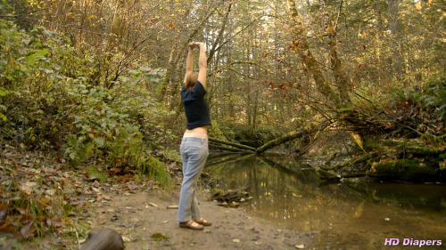 freefetishpics:  Check out the waistband of Sosha’s pullup in this video.Walking through the woods, Sosha is wearing a pullup under her jeans.   The waistband is peaking out, clearly visible.  We follow her,  enjoying the sight of her waistband as