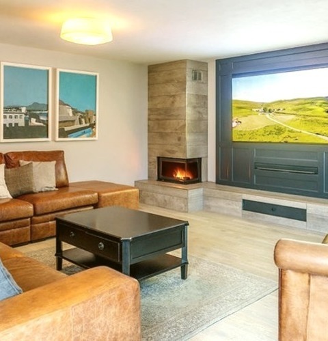 Game Room - Family RoomLarge Minimalist Open Concept Light Wood Floor Game Room Photo With Gray Walls,