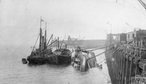 Salvaging of the troopship SS Onward (probably 1918).SS Onward was built in 1905 for the South Easte