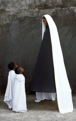 thingstolovefor:    Gorgeous portraits by Maïmouna Guerresi     Maïmouna Guerresi who was born in Italy as Patrizia Guerresi where she was raised as a Catholic. She later changed her name when she married a Senegalese man, and converted to Sufi Islam.
