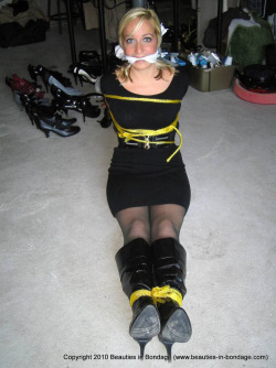 thehogtiesthatbind:  bondagewetdreams:  More Hot BDSM Here  Bound in Black