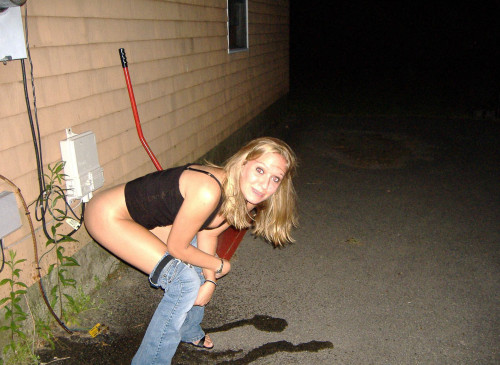 Drunk girl caught pissing in public