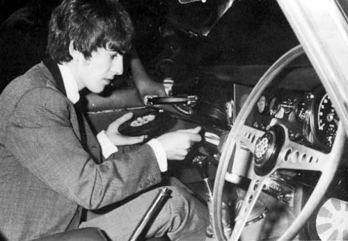 Vintage photographs of a time when cars had vinyl record players. See more here…