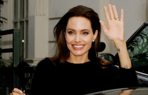 xo-jolie:  Angelina Jolie looks angelic as she waves to fans while leaving the Pavillon Gabriel foll