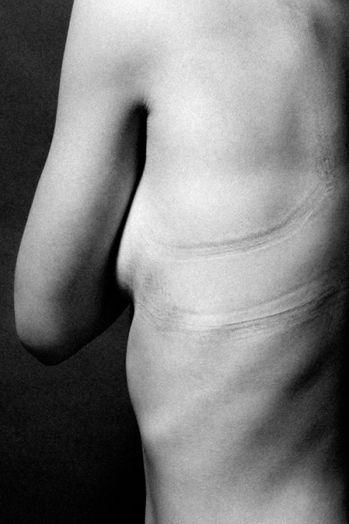 vvolare:  “IMPRESSION” Series by Justin Bartel, showing what women wear to attract men and how that literally hurts/binds/imprints them.  Image titles come from actual women’s fashion magazines.  1). Underwire cups gives Lauren’s boobs a boost
