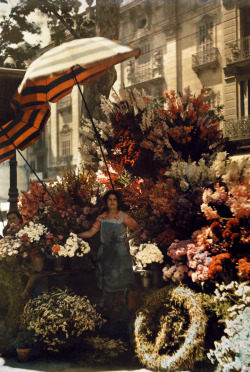 natgeofound:  A woman stands in front of her flower stand on the Rambla in Barcelona, Spain, March 1929.Photograph by Jules Gervais Courtellemont, National Geographic