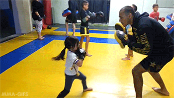 mma-gifs:  5 year old shows off her Muay Thai Combos 