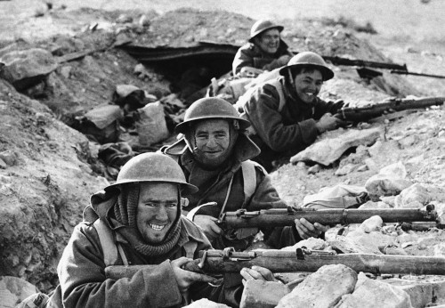 British infantrymen in a shallow trench near Bardia, a Libyan portthat had been occupied by Italian 