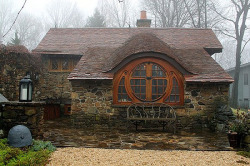 cynicalskin:  Lifelong fan of J.R.R. Tolkien built this 600-square-foot building to house his rare books and Tolkien-inspired memorabilia. 