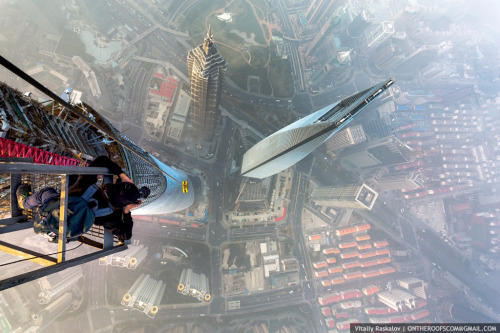 fergyness:  cjwho:  Rooftoppers Secretly Climb 650-Meter-High Crane in Shanghai by Vitaly Raskalov and Vadim Makhorov | via Russian photographers and adrenaline junkies Vitaly Raskalov and Vadim Makhorov, who are no strangers to traveling to the world’s