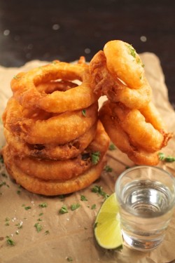 hoardingrecipes:  Tequila Battered Onion Rings with Honey Lime Yogurt Sauce