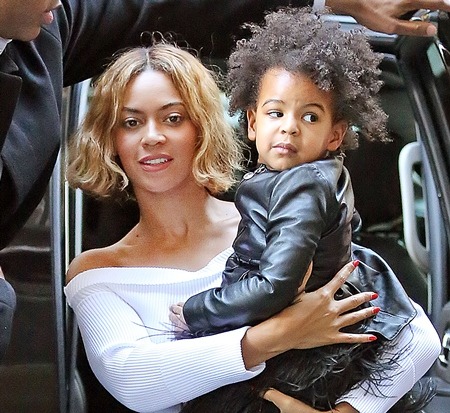 Is Beyonce trying to pass off her little boy as a little girl?  Does not anyone else see that this is a little boy dressed up in a dress? Beyonce needs to go to prison for child abuse, imagine how screwed up this little boy is going to be when he gets