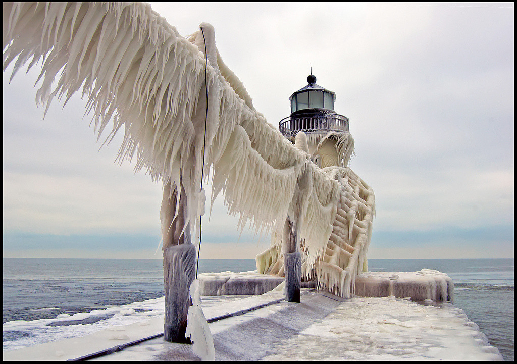 odditiesoflife:  Frozen Pier at Lake Michigan Located on Lake Michigan is the century