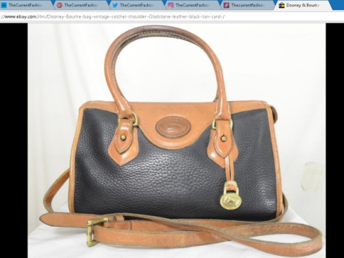 Dooney & Bourke Gladstone leather bagblack with tan trim.  Made in USA.stores.ebay.com/th