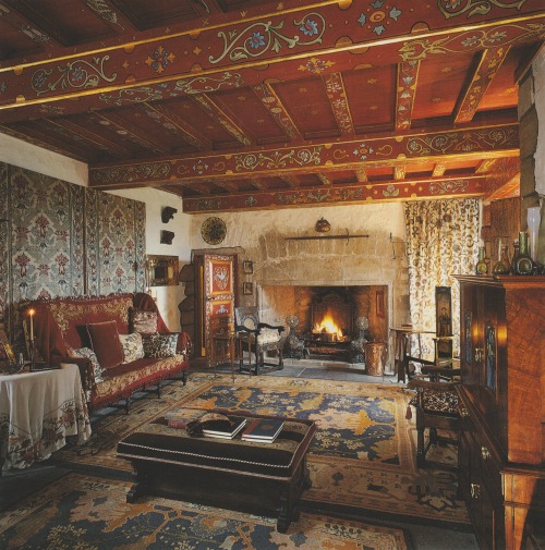 vintagehomecollection:In an ancient stone-flagged Scottish house, a damask-patterned wall hanging an
