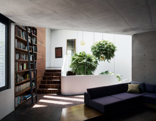 archatlas:  Ventura House in MonterreyThis house by Mexican architect Tatiana Bilbao comprises a cluster of five-sided concrete blocks that emerge from a forested hillside to offer panoramic views towards the city of Monterrey. The uneven terrain informed