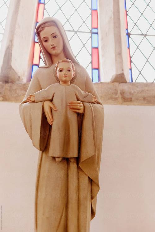 apenitentialprayer: Statue of Mary and Jesus in front of Stained Glass; Norfolk, England. (x)“