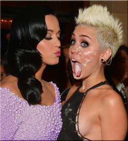 famousfakes:  Katy goes in for a taste. Looks about right.
