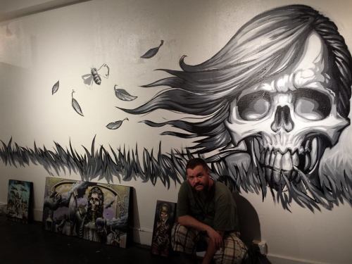 A pic of me finishing the mural before the Hive Gallery show.