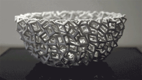sixpenceee:As artist John Edmark’s sculptures wiggle, wobble, and twist before your eyes like some alien creature, it’s hard to believe that what you’re seeing is a real physical object—but we assure you it is, with a bit of trick photography
