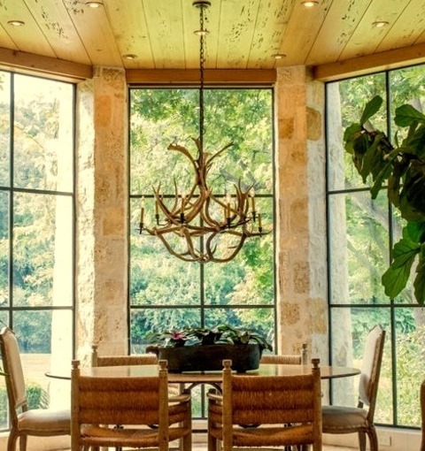 Enclosed Dining RoomExample Of A Mid-sized Mountain Style Brick Floor Enclosed Dining Room Design With