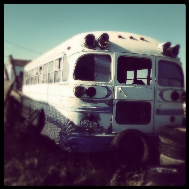 Old bus in a vehicle salvage yard