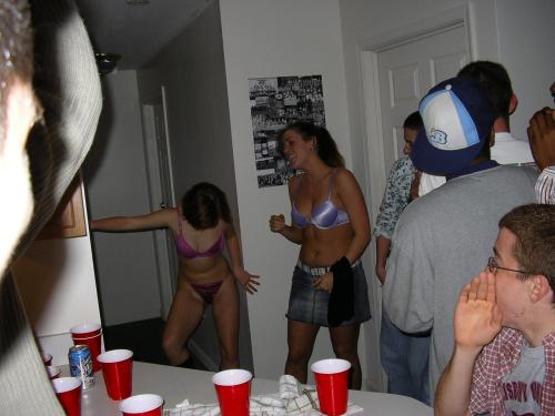 Cute girl loses at strip beer pong, gets totally naked.