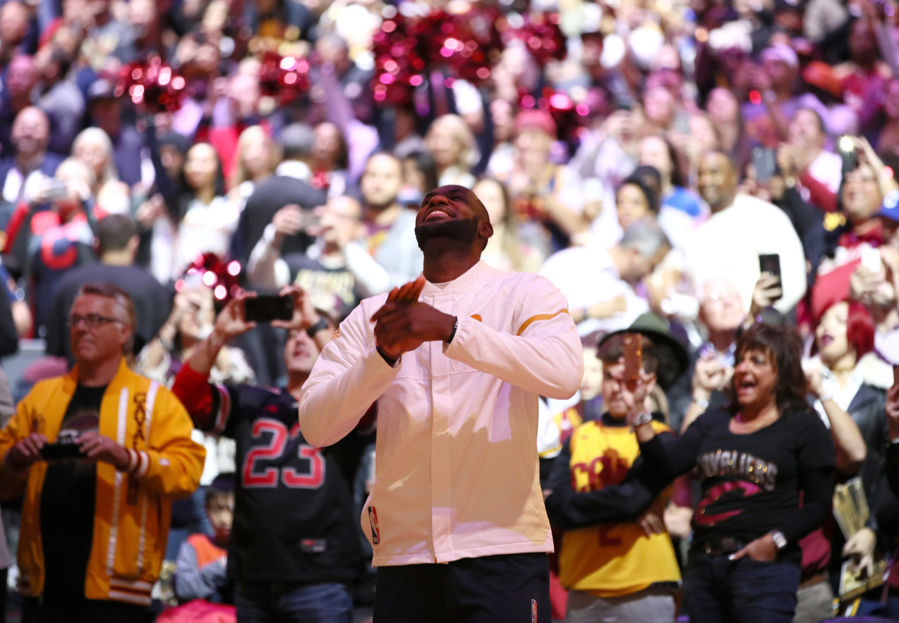 CLEVELAND, OH - OCTOBER 25: LeBron James #23 of the Cleveland Cavaliers reacts during the championship banner raising and ring ceremony before the game against the New York Knicks at Quicken Loans Arena on October 25, 2016 in Cleveland, Ohio. NOTE TO...