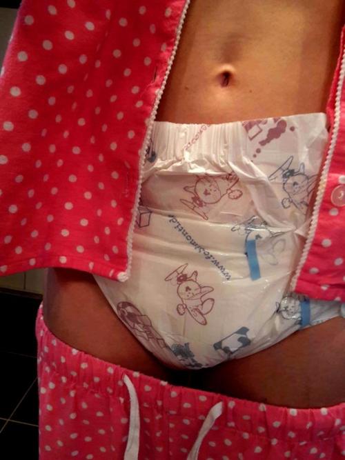   I’m wearing bunny & panda diapers in my PJs (7 pics)  Have you ever seen bunny & panda diapers? They’re made by Fabine. I’m all diapered up and ready for a nap :-)See 7 cute pics on my website:http://abdlgirl.com/2015/11/13/im-wearing-bunny-pand
