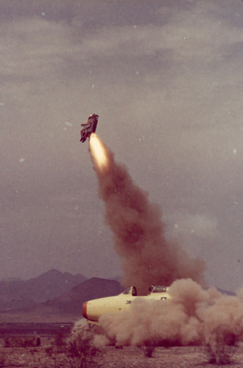 natgeofound: Dummy pilot and seat soar, as engineers test a catapult escape system in Arizona, March