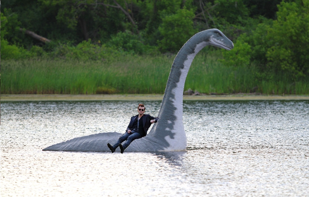 Fuck Yeah Good Omens — Discord requested Crowley riding on the Loch Ness