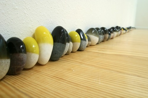 Rubber-Coated Rocks by Nida Sinnokrot Installation, Line of 5m of rubber coated pebbles, 2003 &