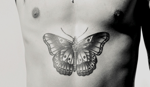 worldstyles: “The butterfly on his torso is based on and old French prison tattoo