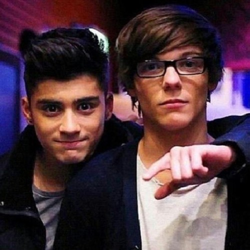 XXX Zouis!!!! Who else loves Lou with glasses??? photo