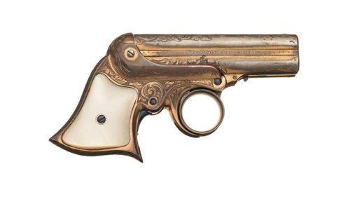 Gold plated and engraved Remington Elliot four shot derringer with pearl grips, manufactured between