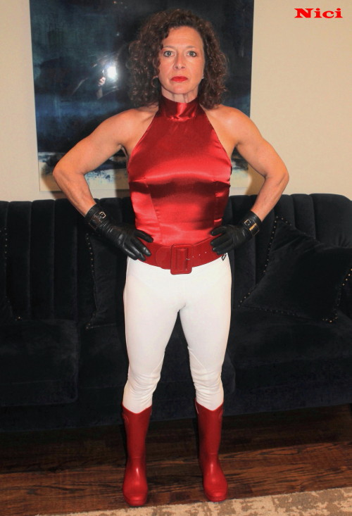 Red satin halter blouse by Lady B Wear, white jodhpurs by Kerrits, wide belt by Grace Karin, leather