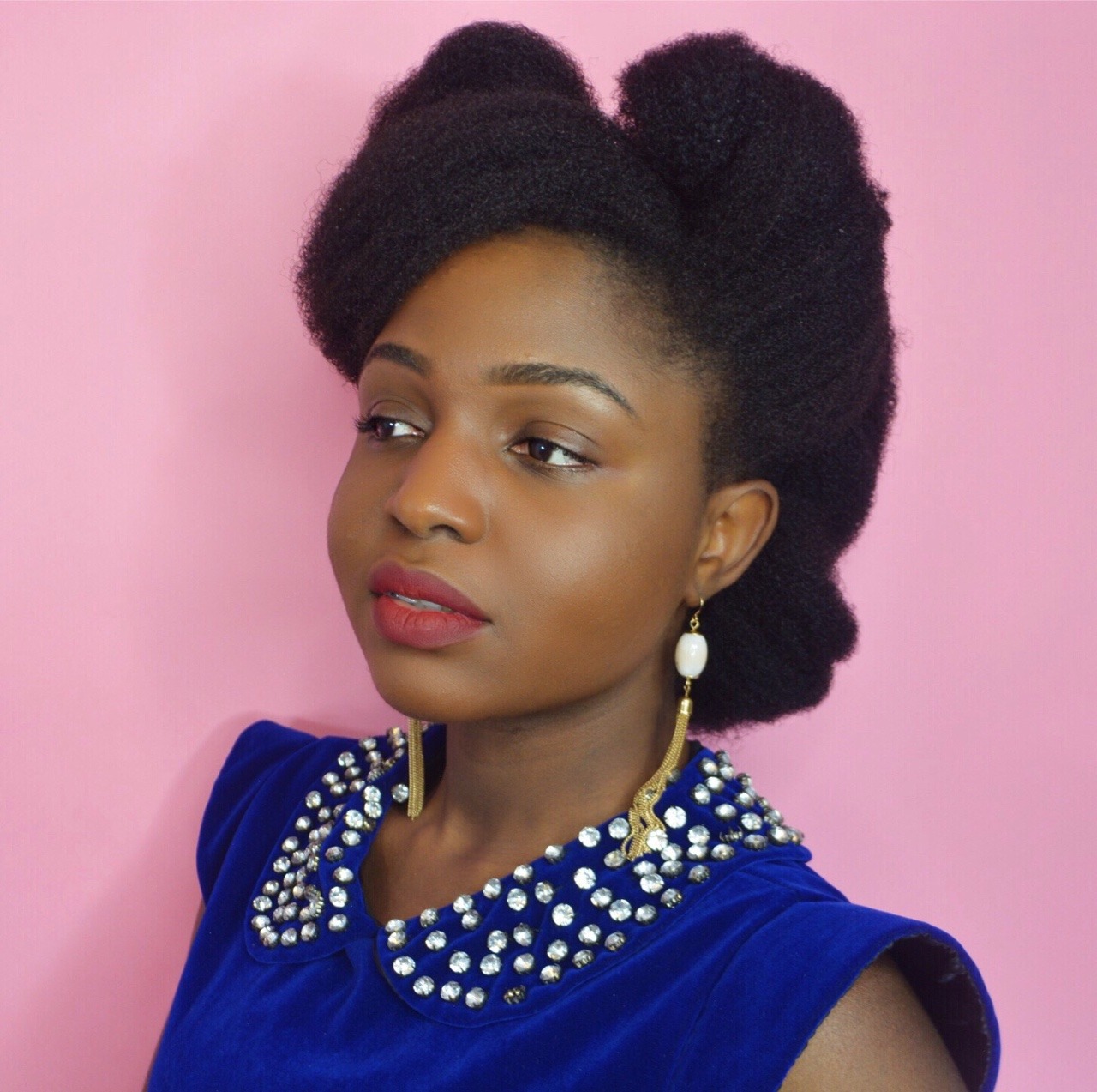 westafricanbaby:  1950s inspired updo on 4c hair 😊. Tutorial on my YouTube channel😋