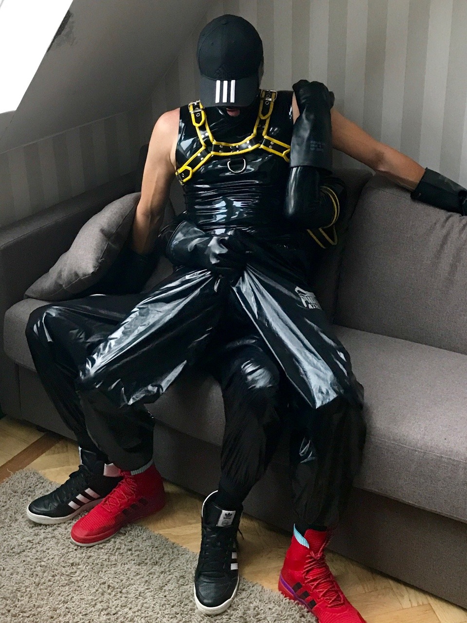 jockeshinylover:  Hot and horny play in phantom and rubber gear 