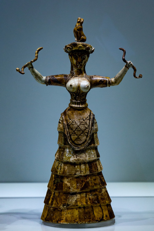 The woman and the snake No 1.A figure of a snake goddess found in the Minoan palaces, Crete 2018.