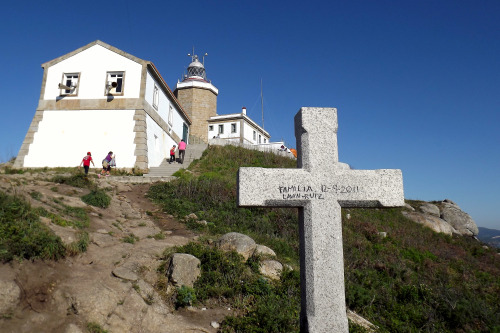 Cross and Lighthouse, Fisterra, Galicia, Spain, 2011It was long thought that Fisterra (in Gallego; i