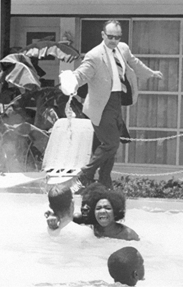 spacecadet:  Hotel owner pouring acid in water when black people swam in his pool,
