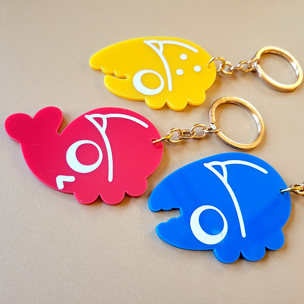 Primary color beetle keychains! The white is engraved into the acrylic!