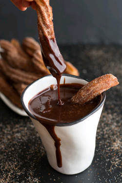 verticalfood:  Mexican Beer Spiked Churros with Chocolate Dulce De Leche.