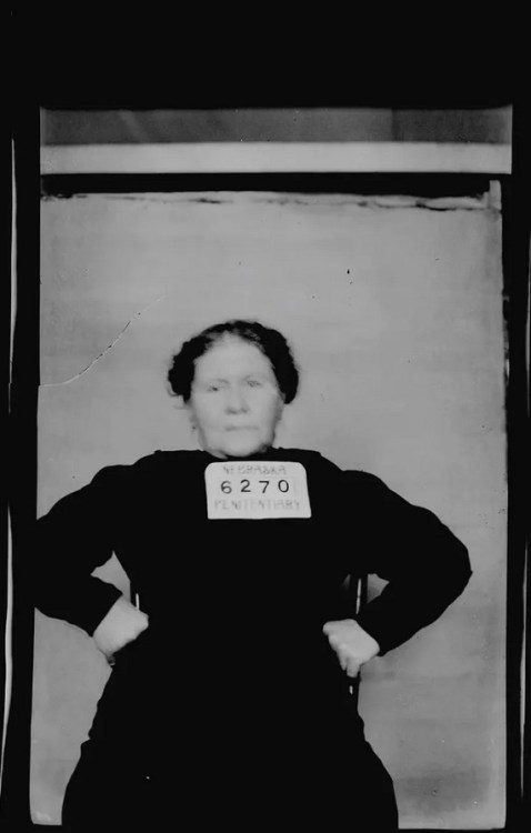 Jennie Lester strikes a defiant pose in her mug shot. Lester was arrested in Phelps county for enticing to illicit intercourse in March 1914. She was sentenced to one to three years in the Nebraska State Prison. Nudes & Noises  