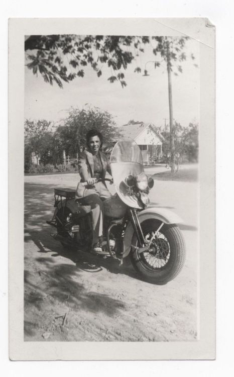 woman on a police motorcycle - found photo via ebay