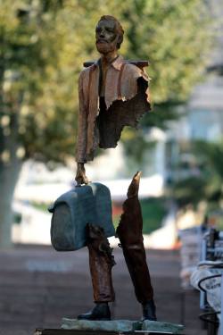 wetheurban:  ART: Surreal Sculptures by Bruno Catalano French sculptor Bruno Catalano works in bronze sculpture, with a reoccuring motif. His figures are always lacking mid sections, and seem to be eerily suspended in mid air.  Each of his sculptures