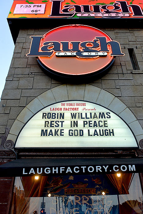 usweekly:  #RIPRobinWilliams Mourners visited sites from Robin Williams’ movies — laying flowers and memorabilia in his honor.  