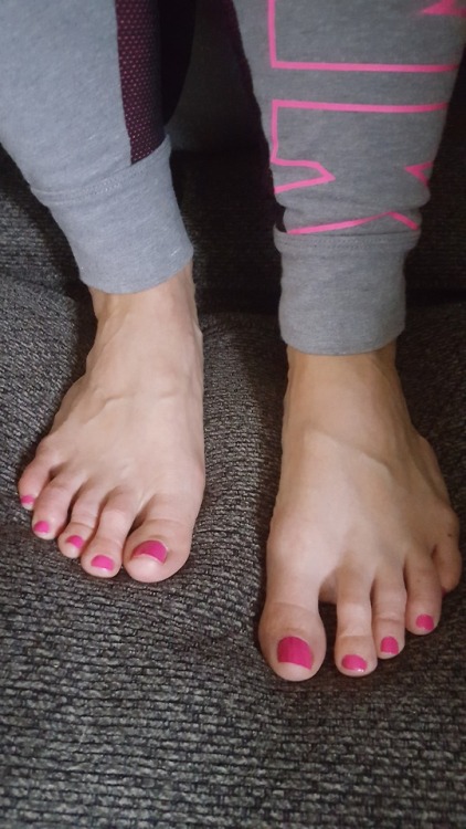 my pretty wifes beautiful candid feet on the couch.please comment