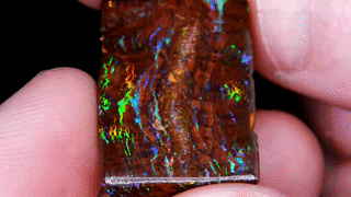 alpakkateppe:  wickeddark:  sixpenceee:  This is opalized wood. (Source)  I need